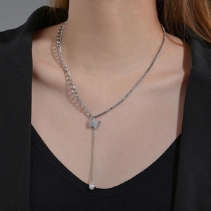 Minimalist asymmetric stainless steel necklace with butterfly pendant and pearl drop detail