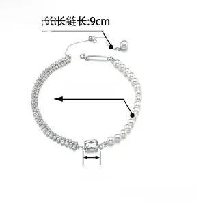 Detail view of pearl and diamond necklace with 32cm chain length and 9cm extension