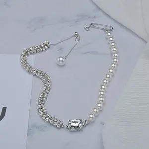 Asymmetric pearl and double-row rhinestone necklace with a rectangular clear stone pendant