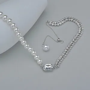 Elegant necklace with pearl string, double-row diamond chain and large rectangular crystal