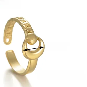Macro detail of adjustable gold sun and moon ring showing chain texture and 0.8cm width