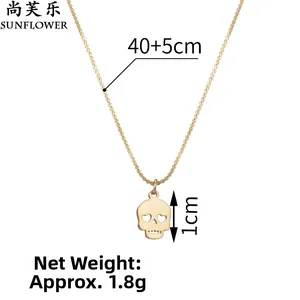Close-up of golden skull necklace with heart-shaped eyes and 40+5cm adjustable chain