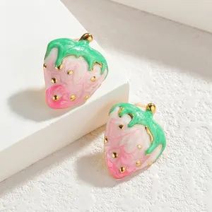 Pink strawberry enamel stud earrings in gold plated stainless steel with green leaf accents