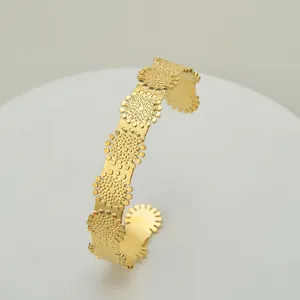 Retro 14K gold plated titanium steel open bangle with intricate sunflower floral design