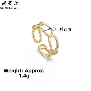 Detail showing 1.4g gold chain ring weight and 0.6cm width of the hollow link design