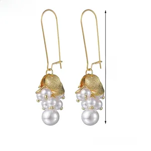 Detail view of pearl cluster grape earrings with 6.5cm length and 7.2g weight