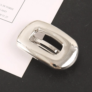 Polished silver alloy rectangular hollow hair clip with minimalist geometric design
