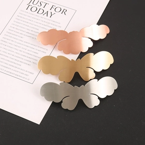 Detailed set of three alloy cloud and butterfly hair clips in gold, silver, and rose gold