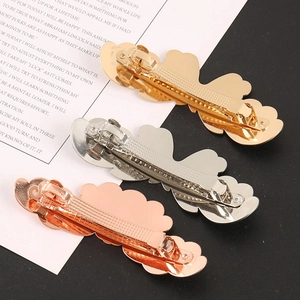 Detailed view of cloud-shaped wave metal spring hair clips in gold, silver and rose gold