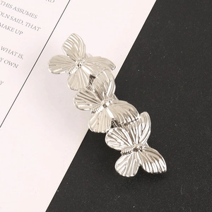 Elegant silver metallic butterfly hair clip for women with detailed wing texture
