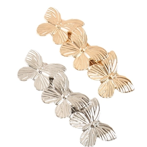 Elegant gold and silver butterfly hair clips set in polished alloy with detailed wings