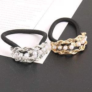 Minimalist black hair ties with gold and silver metal chains and white faux pearl charms