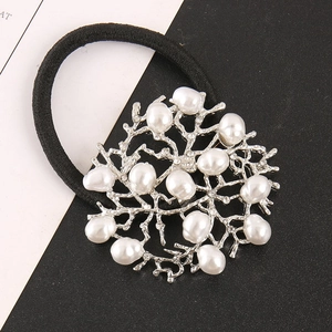 Elegant pearl hair tie featuring coral-like silver alloy with rhinestones and white pearls