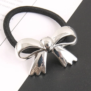 Fashionable ponytail hair tie with silver metallic wavy bow and black elastic cord
