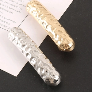 Minimalist hammer textured metal hair clip set in gold and silver finish with wavy design