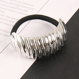 Minimalist irregular silver metal hair tie with pleated texture on elastic band