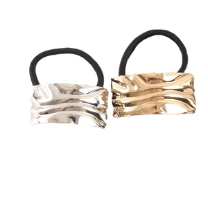 Set of two gold and silver square wavy metal hair ties with elastic black bands