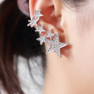 Silver star ear cuff with sparkling rhinestones featuring a stylish five-star curved design
