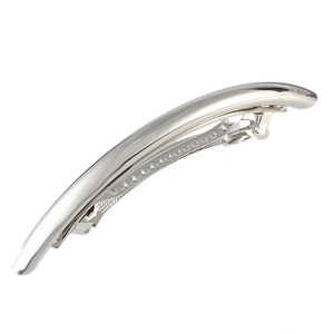 Minimalist silver metal curved hair clip with polished mirror finish on white background