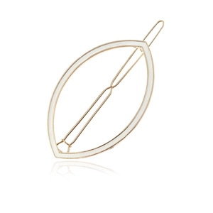 Elegant gold metal shuttle-shaped hair clip with white enamel finish on white background