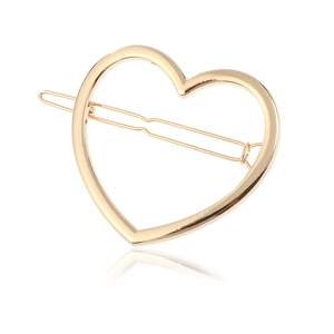 Detailed view of hollow heart hair clip with gold plating and long snap barrette