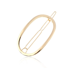 Barrette à cheveux ovale en métal doré minimaliste avec finition métallique
