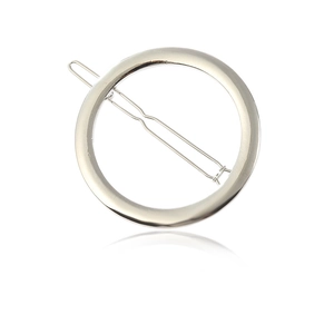 Minimalist silver circular metal hair clip with a smooth mirror polished geometric finish