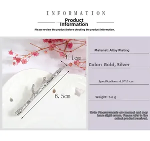 Detail view of branch-shaped alloy hair clip with product dimensions and specs