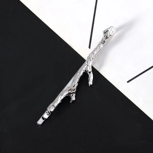 Minimalist silver branch hair clip with textured matte finish for women hair styling