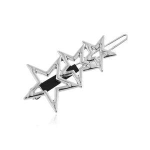 Polished silver metal hair clip with triple hollow star design on a white background