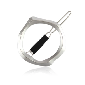 Detail view of silver irregular geometric hair clip with matte finish and non-slip pin