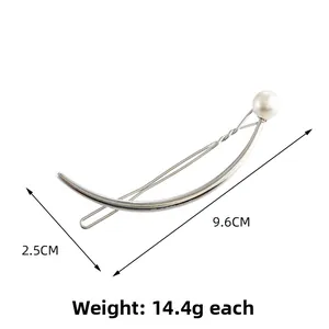 Detailed size view of silver arched metal hair clip with pearl showing 9.6cm length