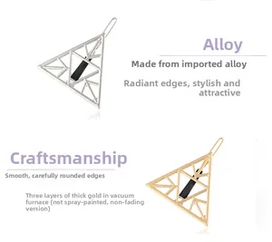 Close-up of gold and silver hollow triangle hair clips with vacuum plating finish