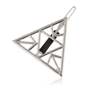 Minimalist silver triangle hair clip with intricate hollow geometric pattern on white background