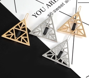 Fashionable hollow triangular metal hair clips in gold and silver plating