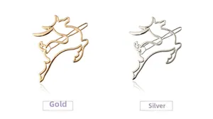 Close-up of minimalist hollow deer hair clips in polished gold and silver metal finishes