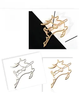 Detailed close-up of hollow deer hair clips in polished gold and silver metal finishes