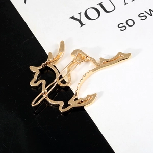 Elegant gold hollow reindeer hair clip with polished metal finish for women's hair styling