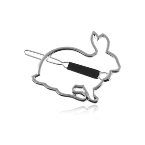 Close-up of a silver hollow bunny hair clip with minimalist metal wire rabbit silhouette