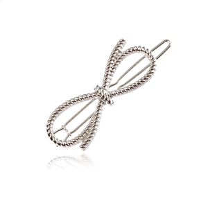 Silver twisted rope infinity metal hair clip with elegant bow shape on white background