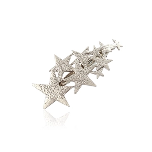 Silver hammered metal star hair clip with tiered star design and duckbill clip