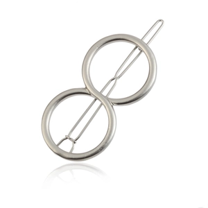 Minimalist silver zinc alloy figure-eight hair clip on a clean white background