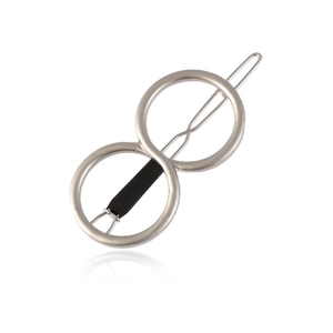 Close-up of a silver polished zinc alloy hair clip with double round circle design