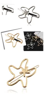 Detailed macro view of hollow starfish hair clips in gold and silver metal finishes