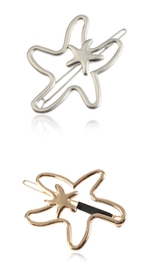 Detailed close-up of hollow starfish hair clips in polished gold and silver metal finishes