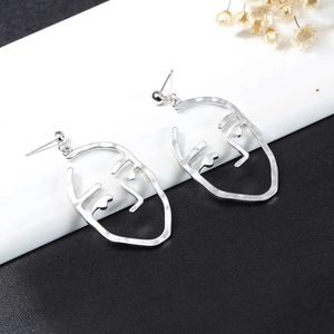 Abstract silver face outline stud earrings with a minimalist artistic wire design