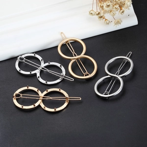 Zinc alloy 8-shaped geometric hair clips in gold and silver finish with smooth textures