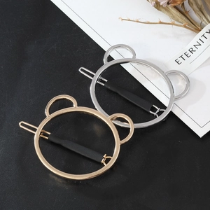 Barrettes à cheveux tête d'ours évidée en or et argent avec une texture métallique lisse