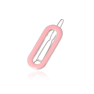 Detailed close-up of a pink oval hair clip featuring a silver-tone metal spring mechanism