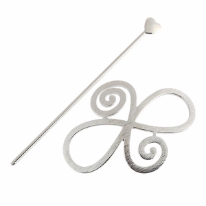 Detail of silver alloy hair pin set featuring a hollow spiral butterfly base and heart top